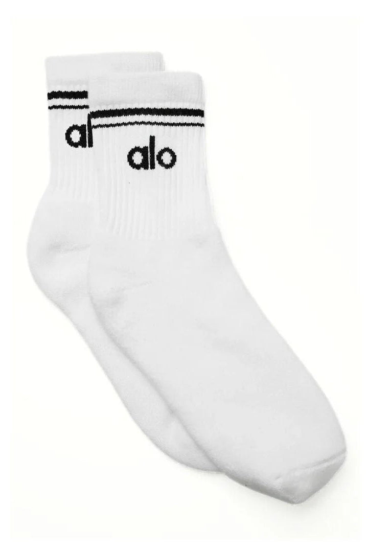 White socks with black logo on a white background